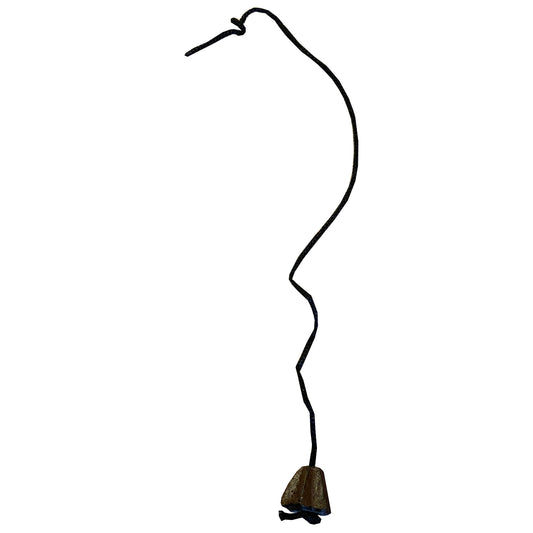 A black metal stand with a curved structure and a weight at the end, designed to hold a cookbook.