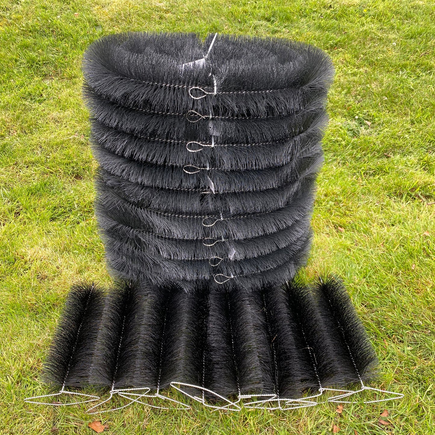40m Black Gutter Brush Leaf & Moss Guard Protection with Set of 8 Downpipe Plugs