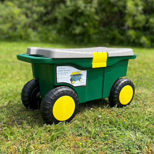 A green and yellow plastic garden tool storage cart with wheels and a seat pad on top, placed on grass.