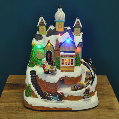 Christmas Village Bakery Scene Ornament with Lights Moving Children's Train and Sound
