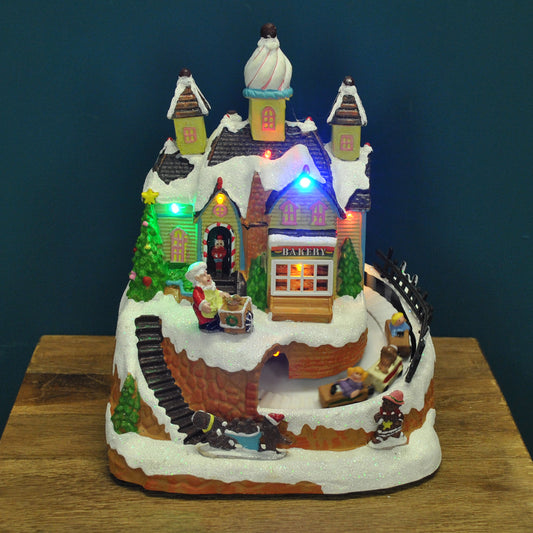 Christmas Village Bakery Scene Ornament with Lights Moving Children's Train and Sound