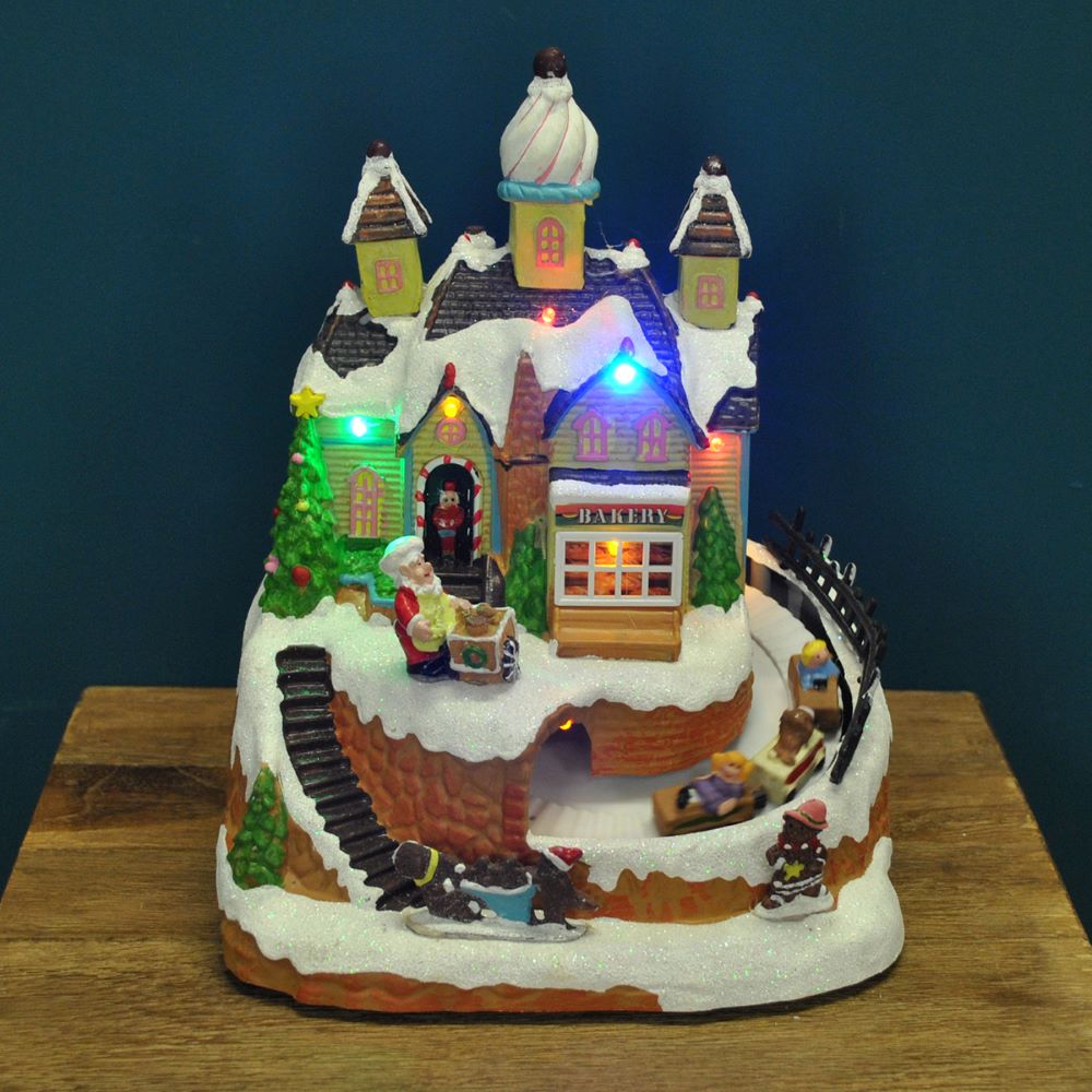 Christmas Village Bakery Scene Ornament with Lights Moving Children's Train and Sound
