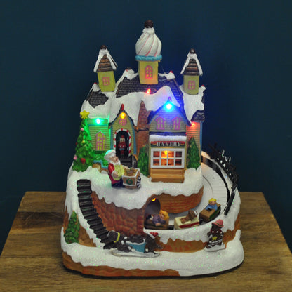 Christmas Village Bakery Scene Ornament with Lights Moving Children's Train and Sound