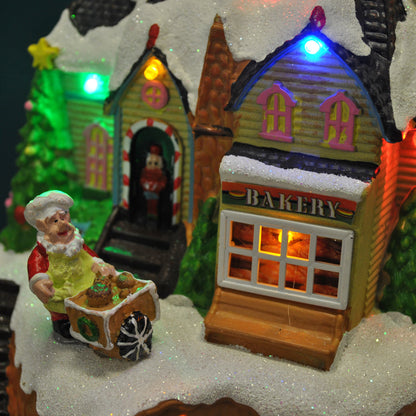 Christmas Village Bakery Scene Ornament with Lights Moving Children's Train and Sound