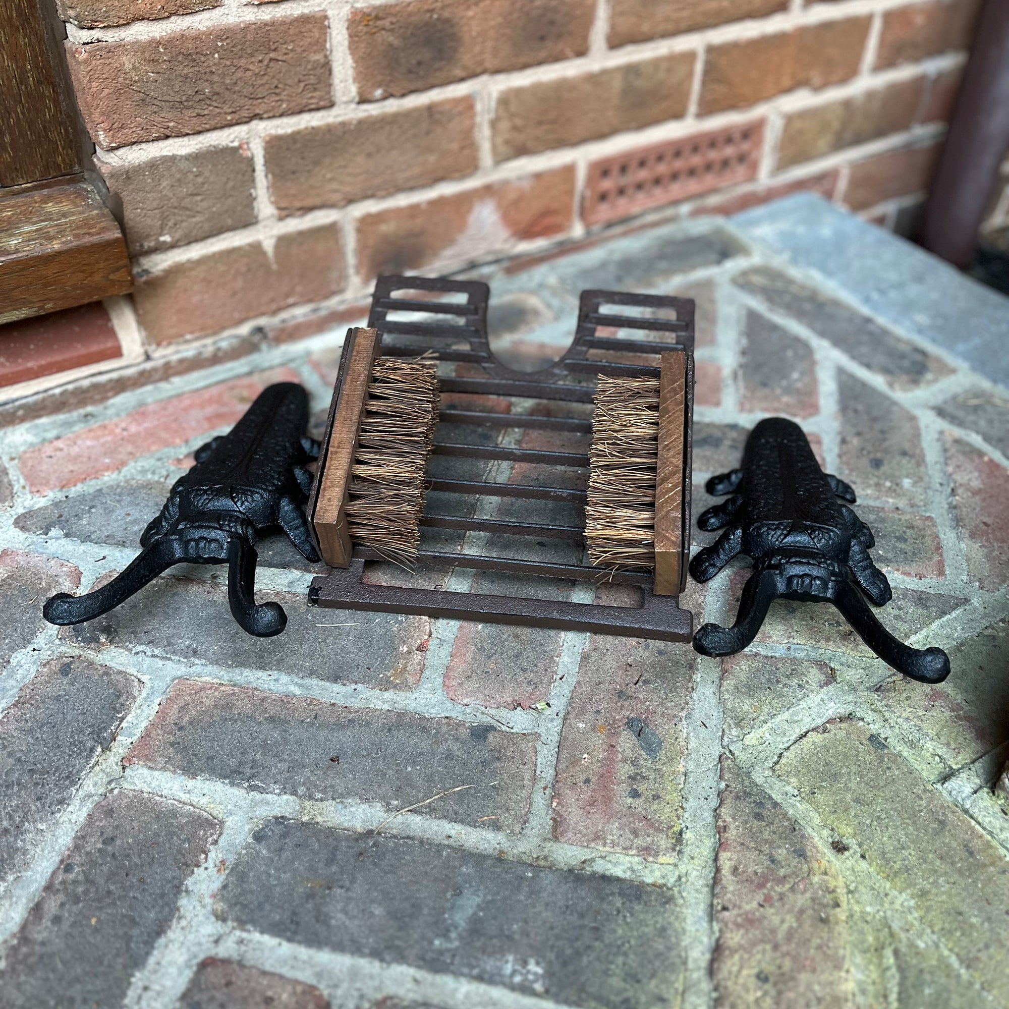 Cast Iron Boot Jack and Scraper with a Pair of Beetle Boot Jacks