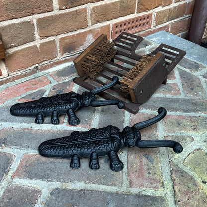 Cast Iron Boot Jack and Scraper with a Pair of Beetle Boot Jacks
