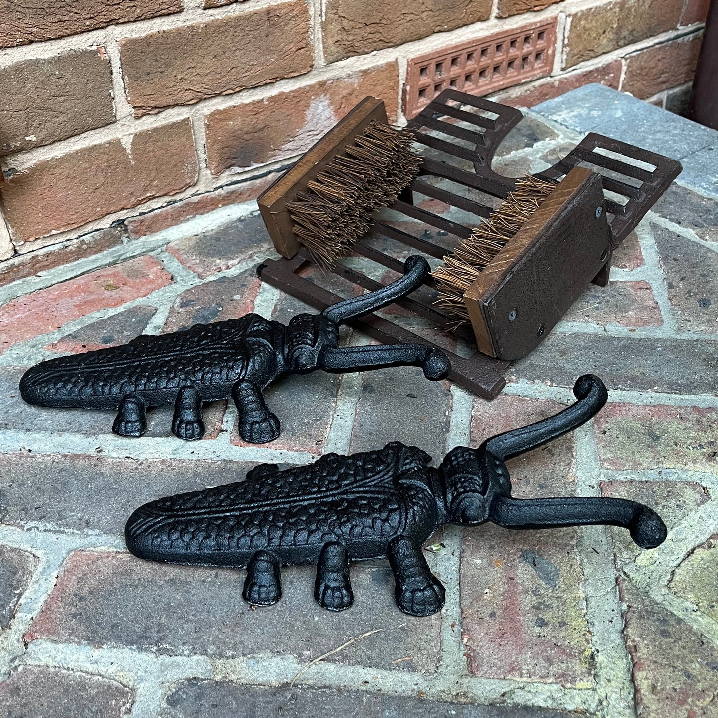 Cast Iron Boot Jack and Scraper with a Pair of Beetle Boot Jacks