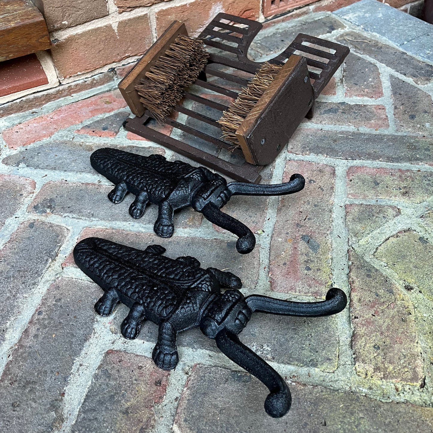 Cast Iron Boot Jack and Scraper with a Pair of Beetle Boot Jacks
